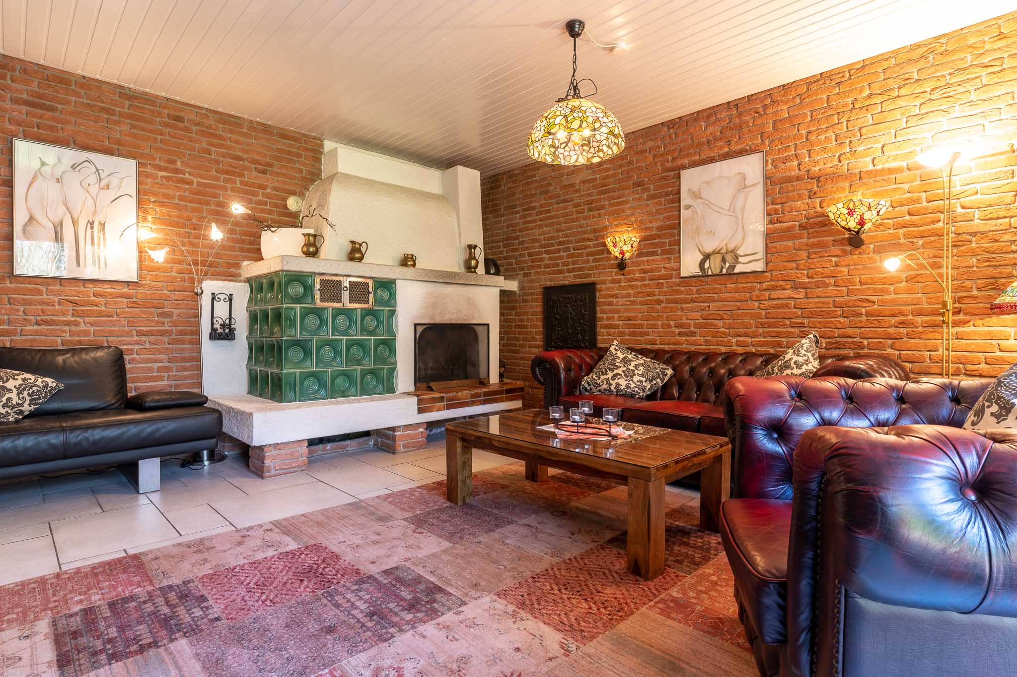 Komfort-Ferienwohnung Sitzecke am Kamin