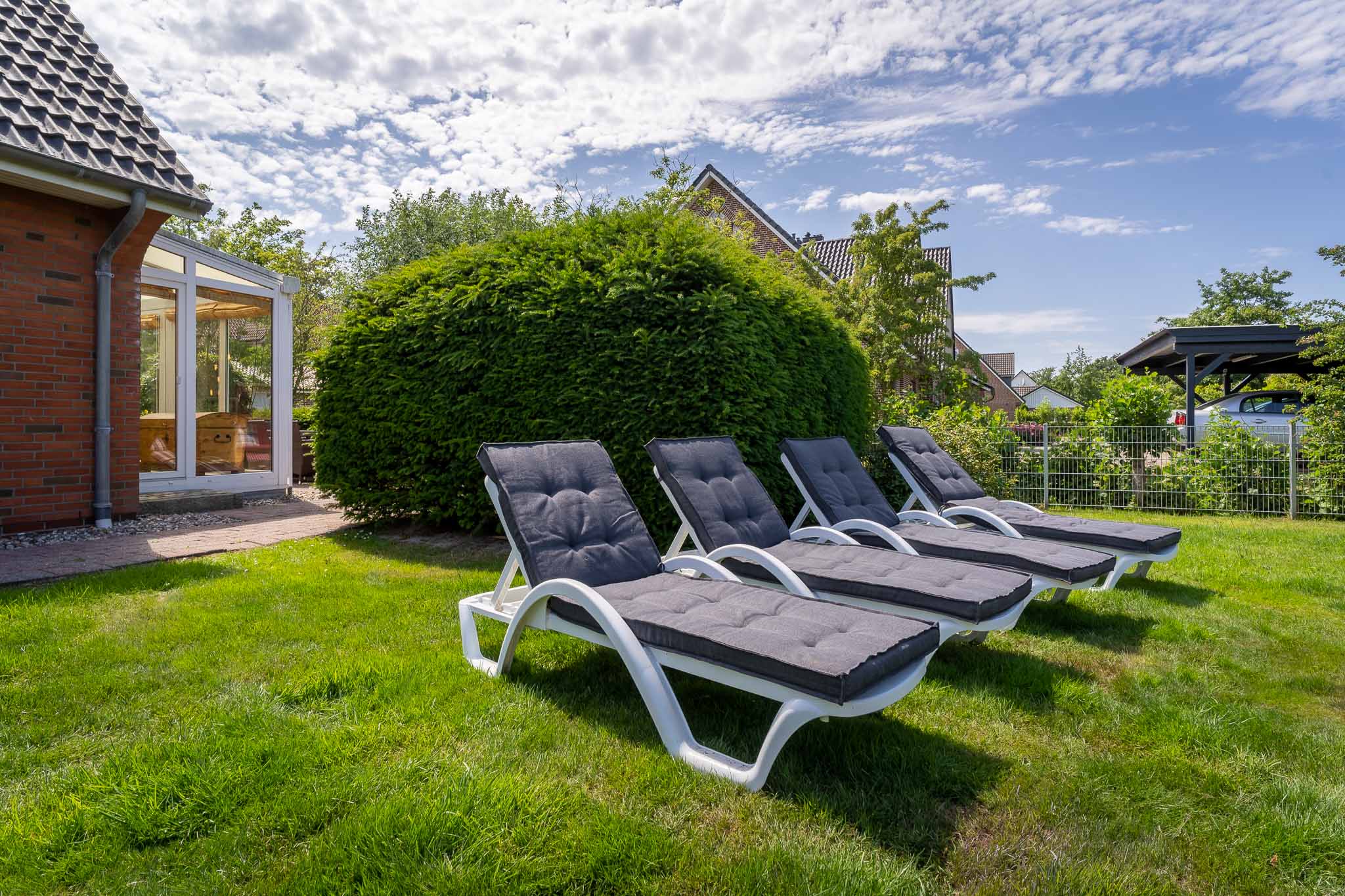 Ferienhaus Wildrose Garten Liegen